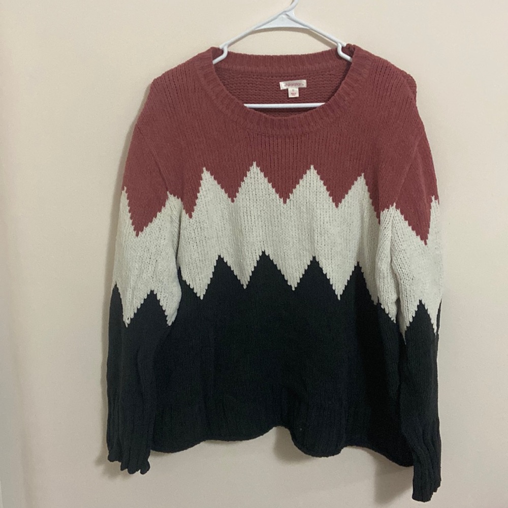 Thick long sleeve sweater.
